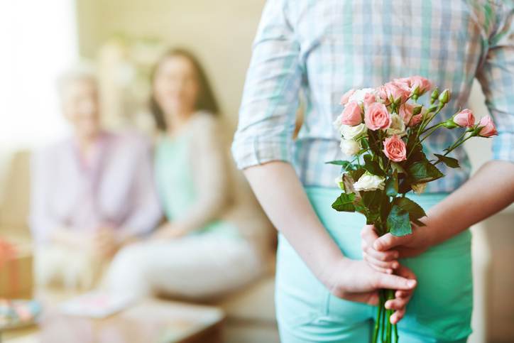 Fresh flowers in hands Fresh flowers in hands