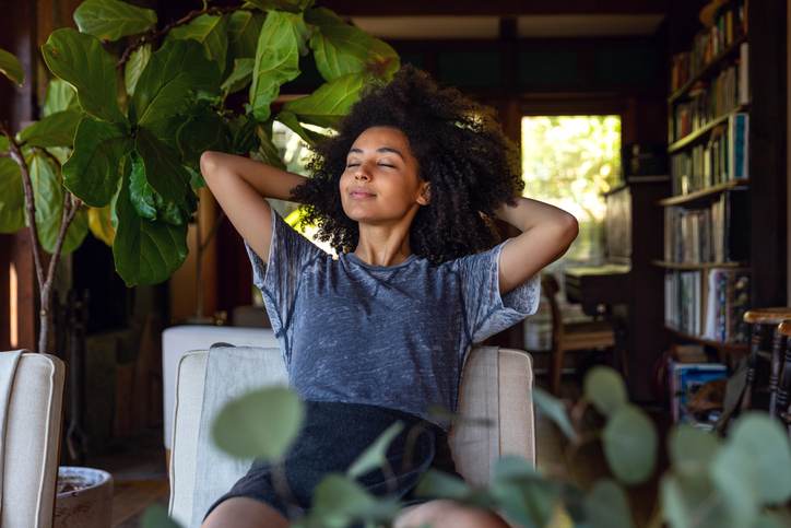 Young woman spending a relaxing day in her beautiful home Young woman spending a relaxing day in her beautiful home